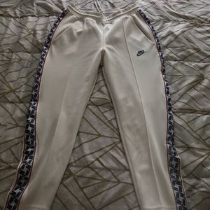 White Nike track pants